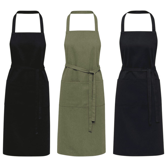 Three aprons in black, olive green, and dark grey with adjustable neck straps and waist ties. Each features a front pocket.