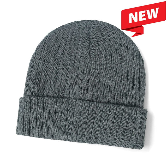 A wool blend beanie in a deep grey colour with a ribbed texture and a folded brim. It has a logo on it.