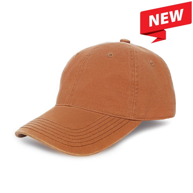 A brown enzyme washed cap with a curved brim, featuring a logo on the front.