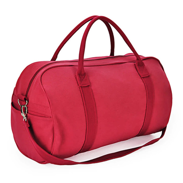 A red duffle bag with shoulder strap and handles, featuring a zipper and a small side pocket.