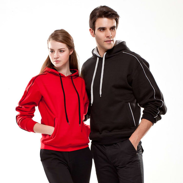 A red hoodie and a black hoodie are worn by a male and female model, both featuring a logo on the front.