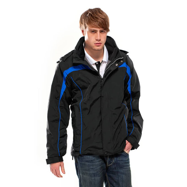 A black jacket with blue accents, featuring a hood and zip closure, worn by a model.