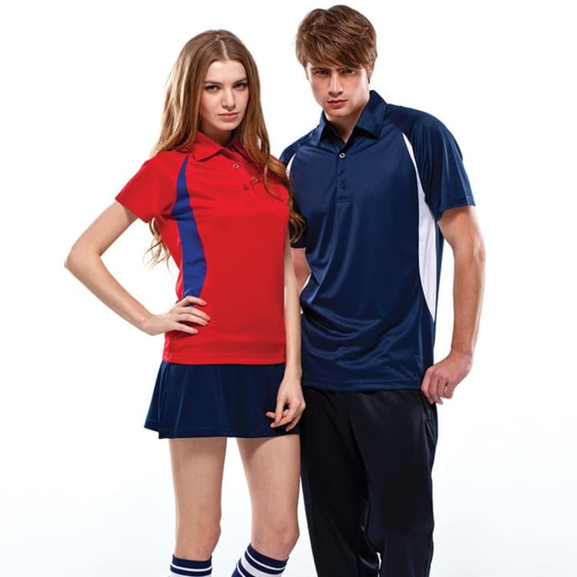 A red polo shirt for women and a navy polo shirt for men, both featuring contrasting colours and a logo.