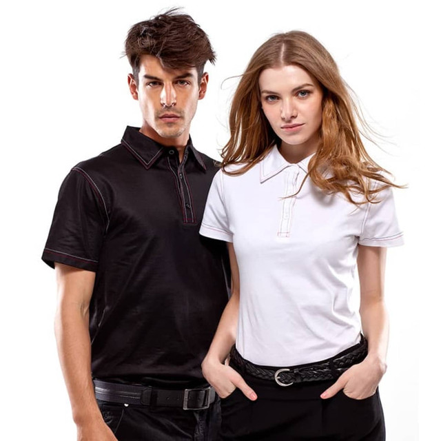 A black polo shirt and a white polo shirt on two models, featuring contrasting stitching and a logo on the left side.