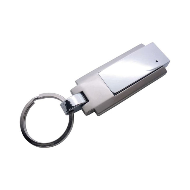 A metallic silver flash drive shaped like a keychain, featuring a shiny clip and a keyring attachment.