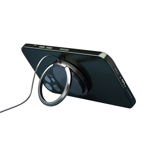 A black smartphone with a magnetic wireless charger attached to the back, featuring a sleek design.