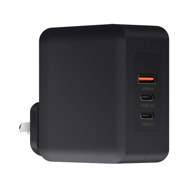 A black 100 Watt GaN quick charger featuring multiple USB ports and a plug attachment.