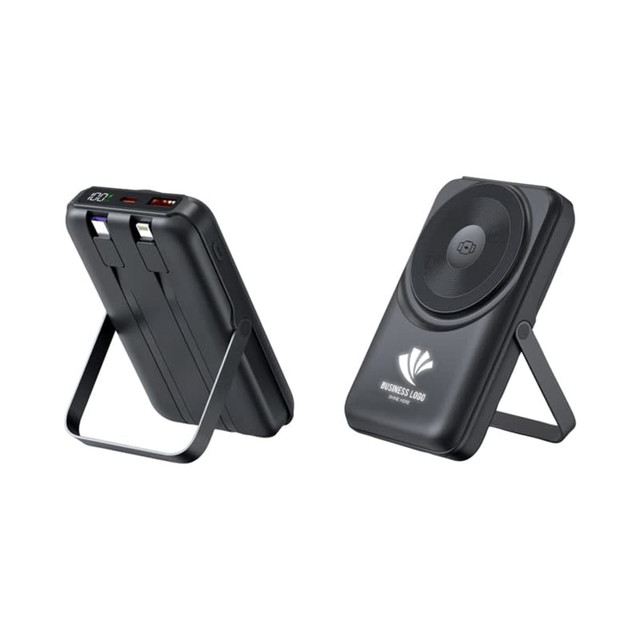 A black wireless power bank with a stand, featuring multiple ports and a charging pad.