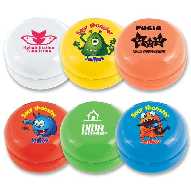 A collection of colorful yo-yos in orange, green, yellow, and white, featuring various character designs and logos.