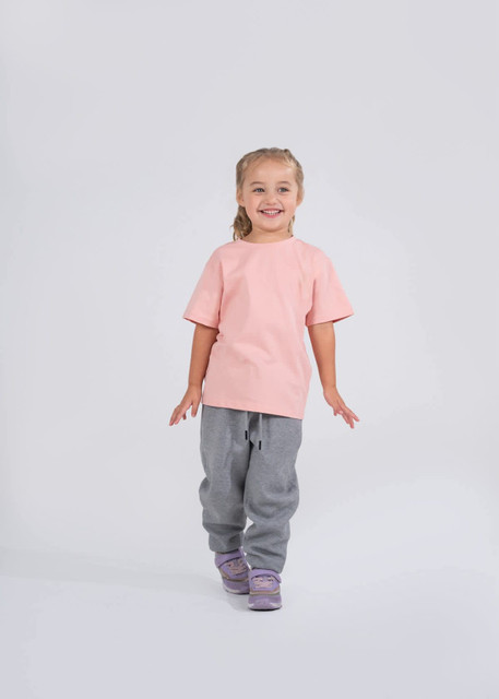 A teal kids' T-shirt with short sleeves and a round neckline, featuring a label inside.