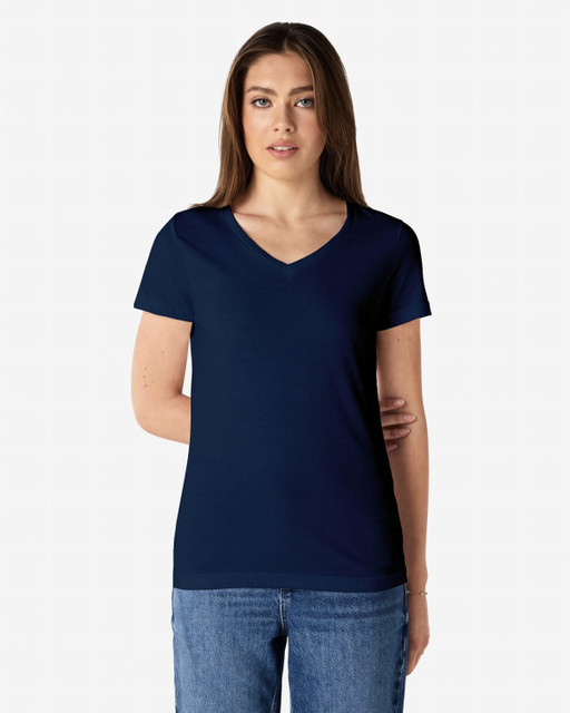 A navy Gildan Softstyle ladies' V-neck T-shirt displayed on a model, featuring a simple design and branding.
