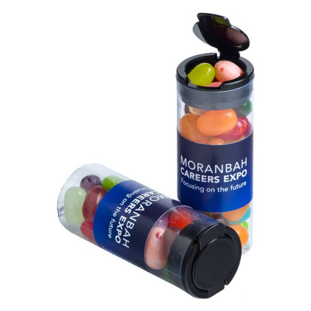 A clear flip lid tube filled with vibrant JELLY BELLY jelly beans, featuring a label and a black lid.