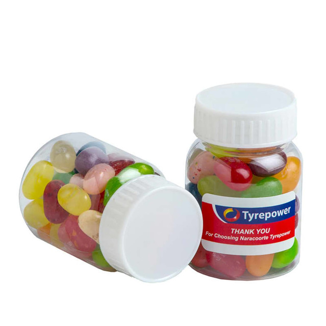 A baby jar filled with colourful JELLY BELLY jelly beans in various flavours, featuring a logo on the side.
