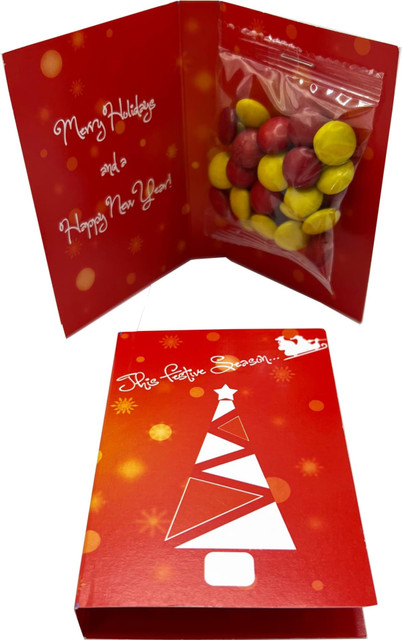 A red promotional gift card featuring a festive message and a bag of colourful choc beans in yellow and red.