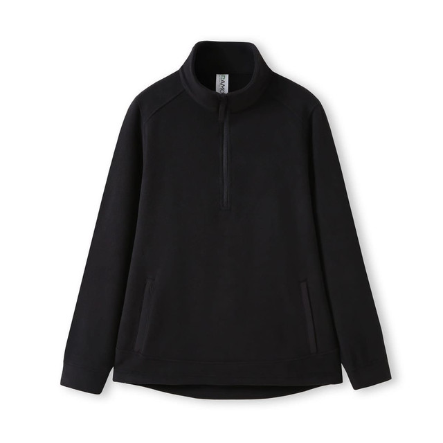 A black polar fleece half zip top with side pockets and a collar. Features a logo on the label.