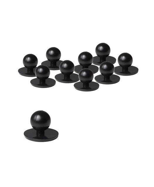 A set of black chef's buttons featuring a round ball on a flat base, arranged in groups of eleven.