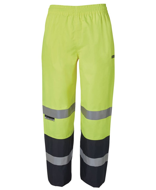 High-visibility rain pants in bright yellow with black lower sections and reflective grey stripes, featuring a logo.