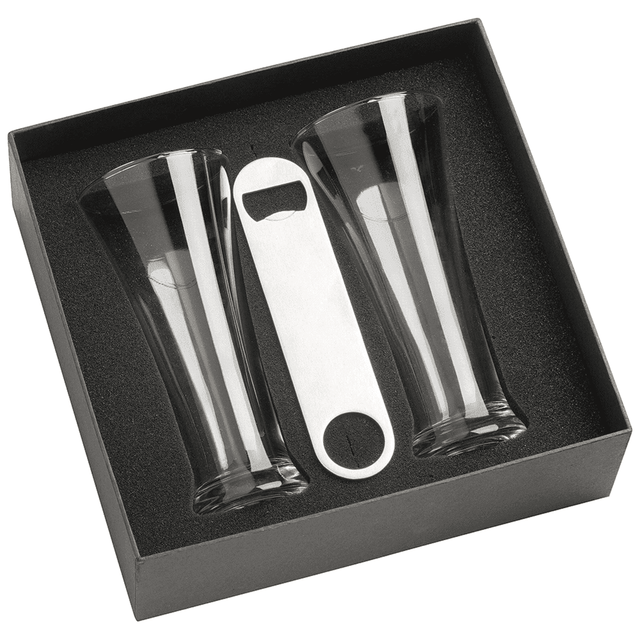 A set of two clear Pilsner beer glasses and a silver bottle opener, packaged in a black box.