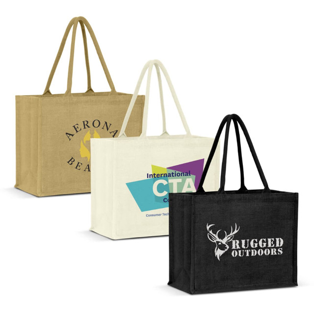 Three jute tote bags in tan, cream, and black, each featuring a different logo or branding design.