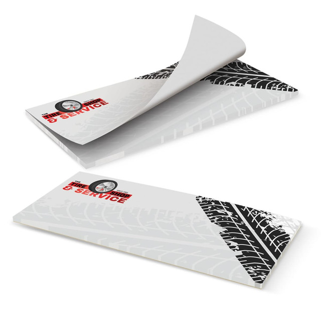 A horizontal notepad with a black and white tire tread design, featuring 50 leaves and a logo.