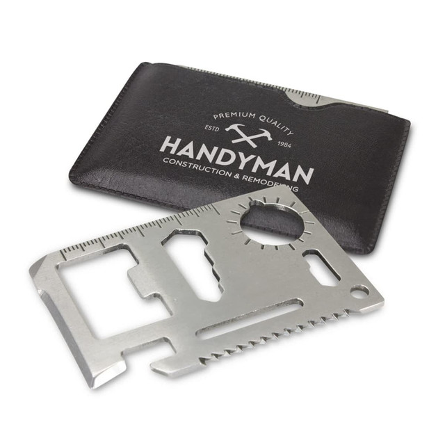 A metallic multi-tool card featuring various tools, placed next to a black cardholder with a logo.