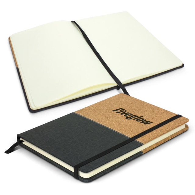 A cork and dark grey notebook featuring an elastic band closure, with blank pages inside and a branding logo.