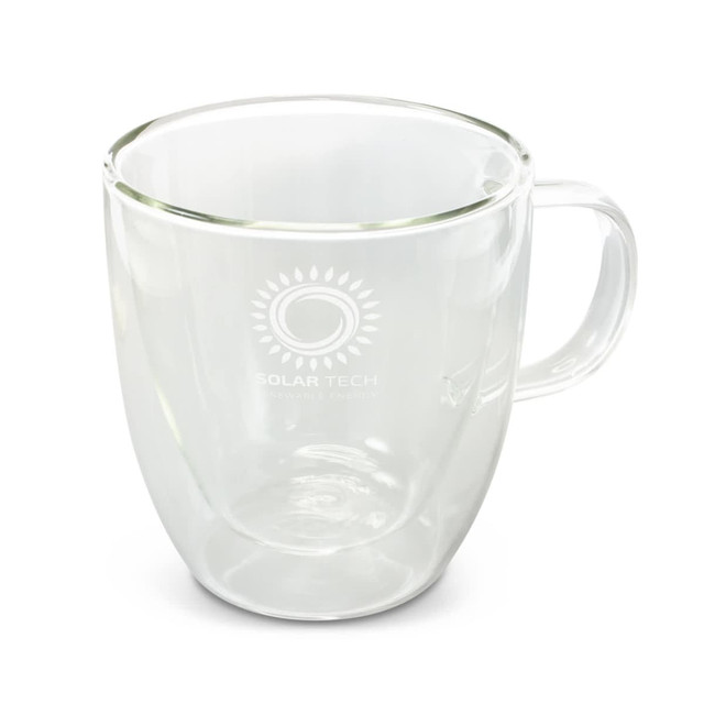 A double wall glass cup with a transparent design and a handle. It features a logo on the front.