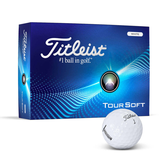 A pack of white Titleist Tour Soft golf balls with a box featuring a logo and blue design elements.
