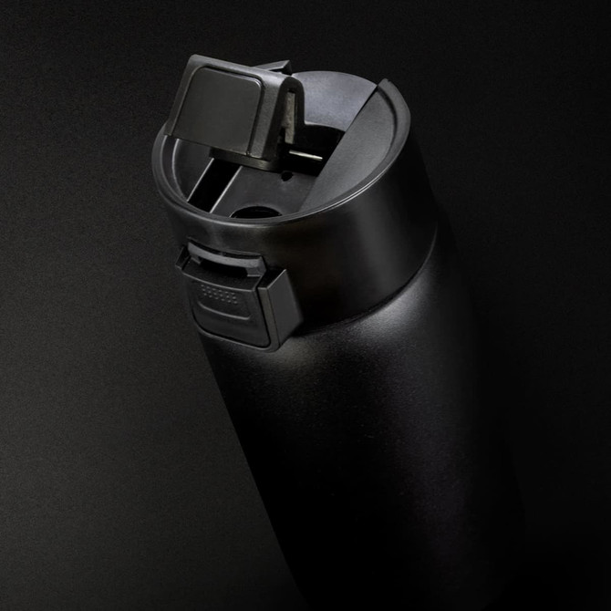 A drink bottle in matte black with a secure lid and a built-in sipping spout, featuring a logo.
