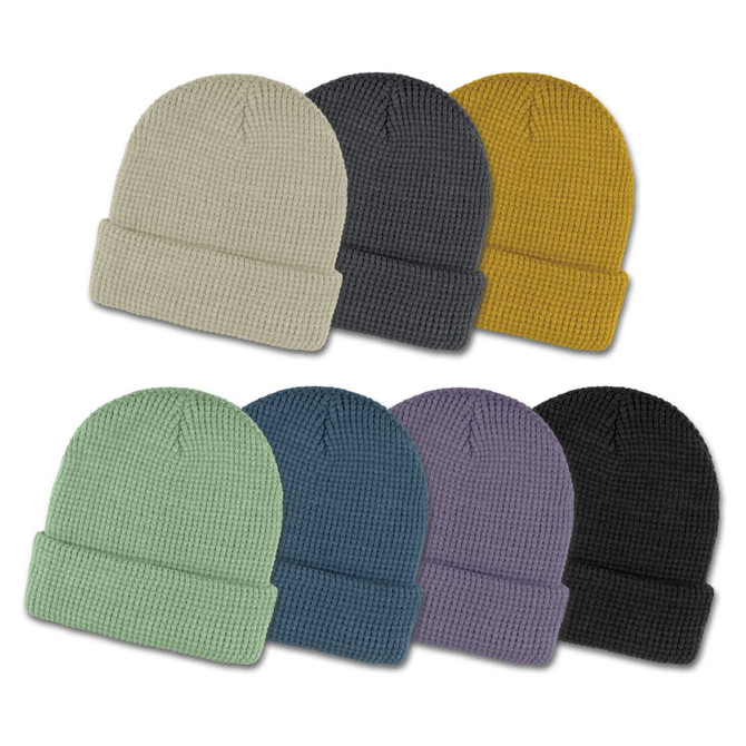 A collection of Galway Waffle Beanies in cream, grey, mustard, mint green, blue, purple, and black, featuring a branded logo.