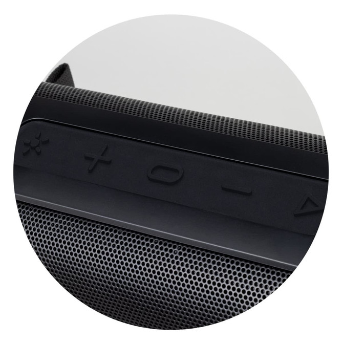 A close-up of a black Bluetooth speaker featuring control buttons and a textured grille.