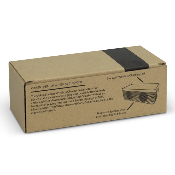 A rectangular box for the NATURA Oaken Speaker Wireless Charger, featuring a cork design and a logo.