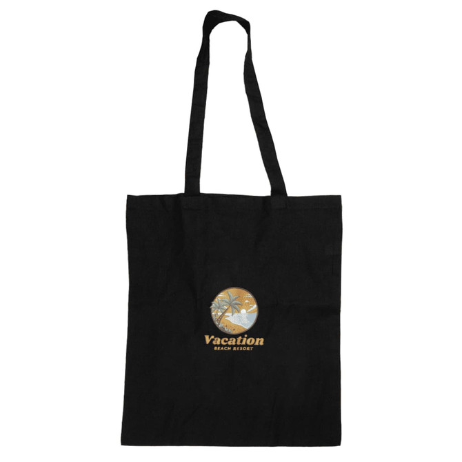 A black canvas tote bag with long handles and a logo featuring palm trees and the word "Vacation".