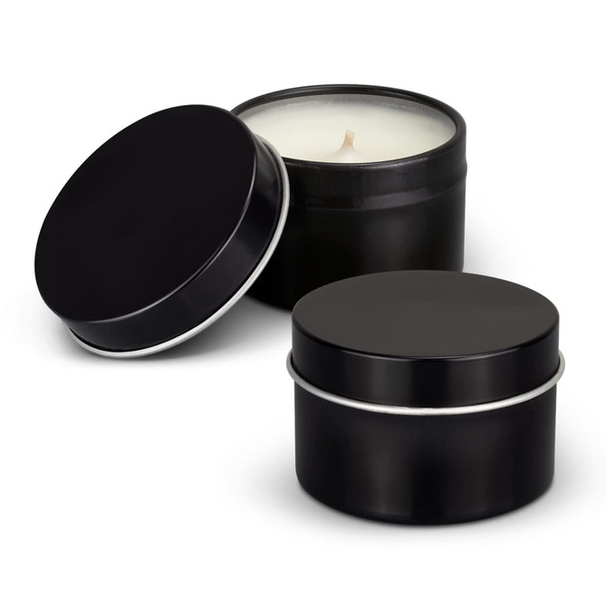 A black tin candle container with a lid, featuring a white candle inside. Another matching black tin is beside it.