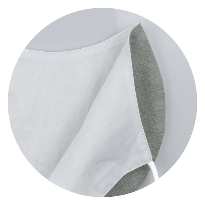 A linen face mask in white and grey, featuring a simple design and a logo on the side.