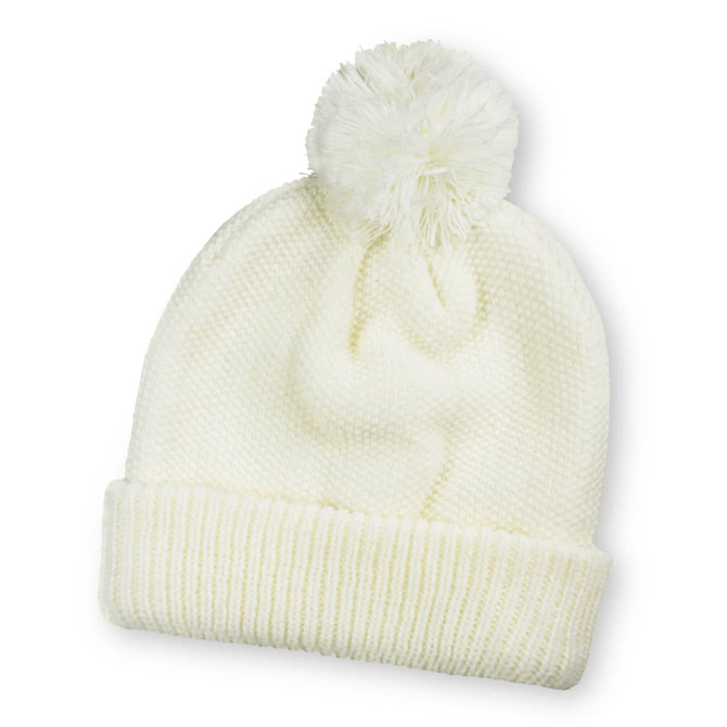 A white knitted beanie with a pom pom on top and a ribbed cuff. It has a branding logo.