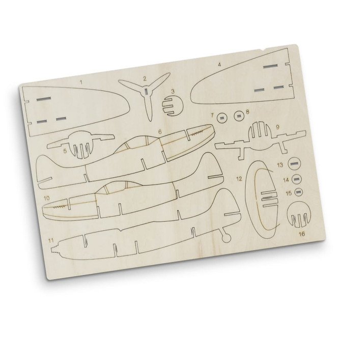 A wooden model kit featuring laser-cut parts for assembling a Spitfire aircraft, showcasing light wood colour.