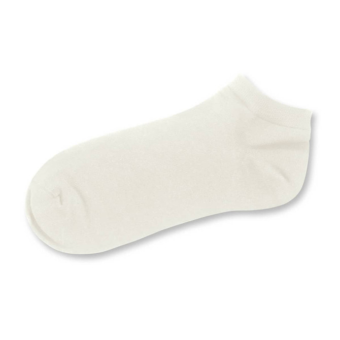 A pair of cream-coloured ankle socks, featuring a smooth texture and a simple design.