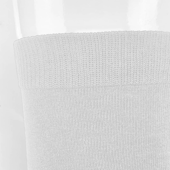 White socks with a ribbed cuff, featuring a logo. The fabric appears soft and comfortable.