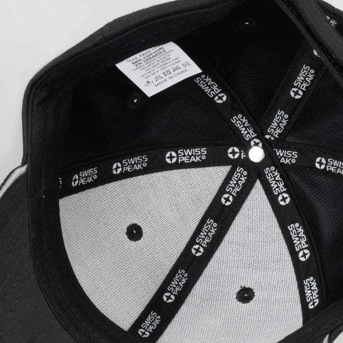 A black cap featuring an inner lining with branding and ventilation holes.