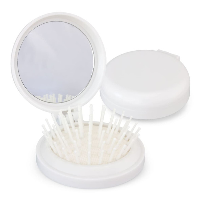A compact white brush with a mirror, featuring an array of bristles inside its open lid.