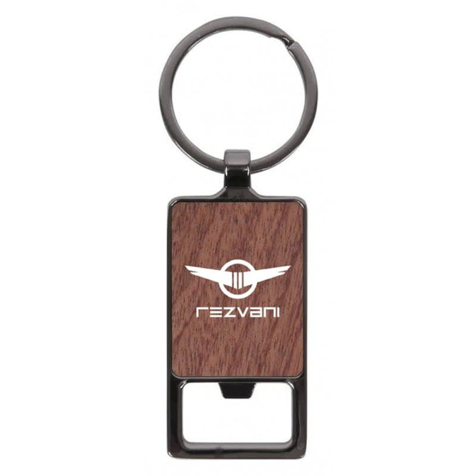 A rectangular keychain with a wood-like texture and a metal keyring. It features a logo on the front.