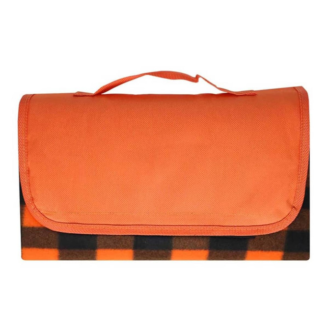A folded picnic blanket featuring an orange top and a black and orange checkered pattern underneath, with a handle.