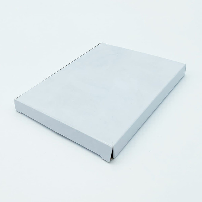 A white rectangular box with a flat lid, featuring a clean, minimalist design.