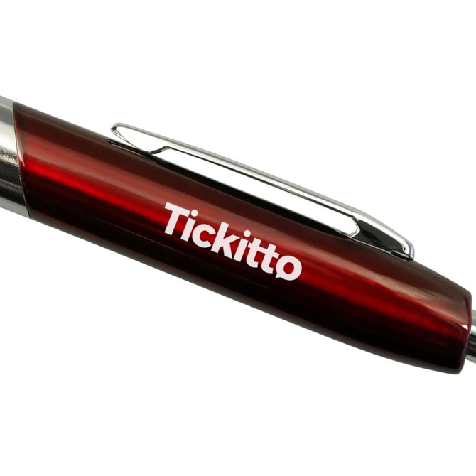 A red plastic pen with a metallic finish and a clip, featuring a logo on the side.
