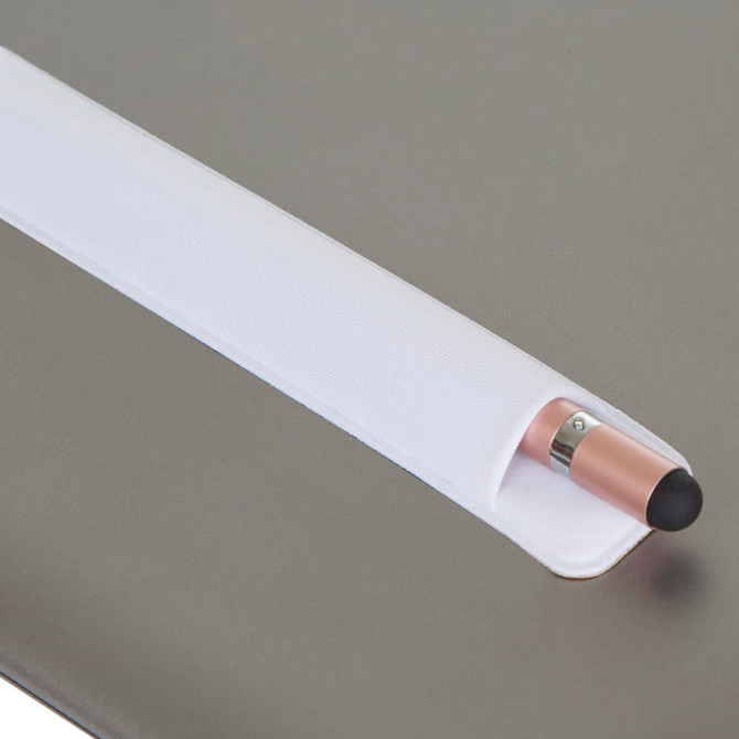 A metal pen with a rose gold finish and a black tip, resting in a white holder on a grey surface.