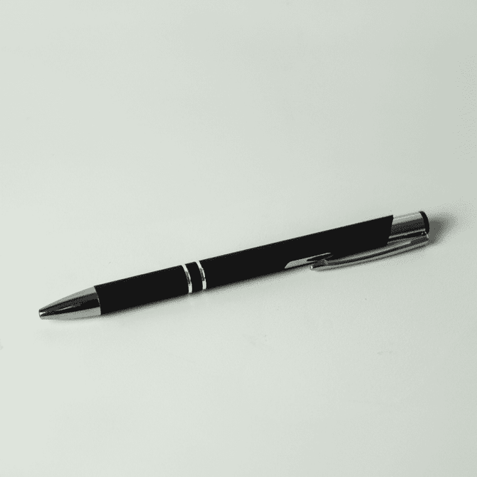 A black metal pen with silver detailing and a clip, featuring a sleek design and polished finish.