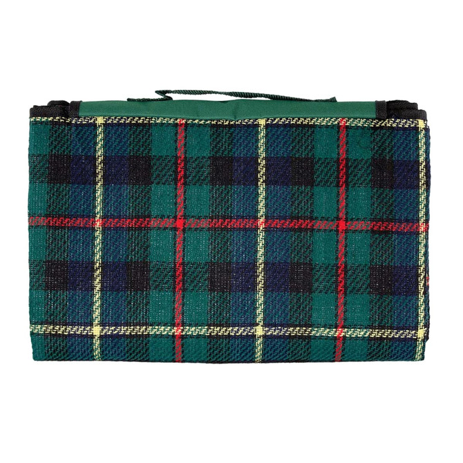 A green and black tartan picnic rug, folded with a carry handle, featuring red and yellow grid lines.