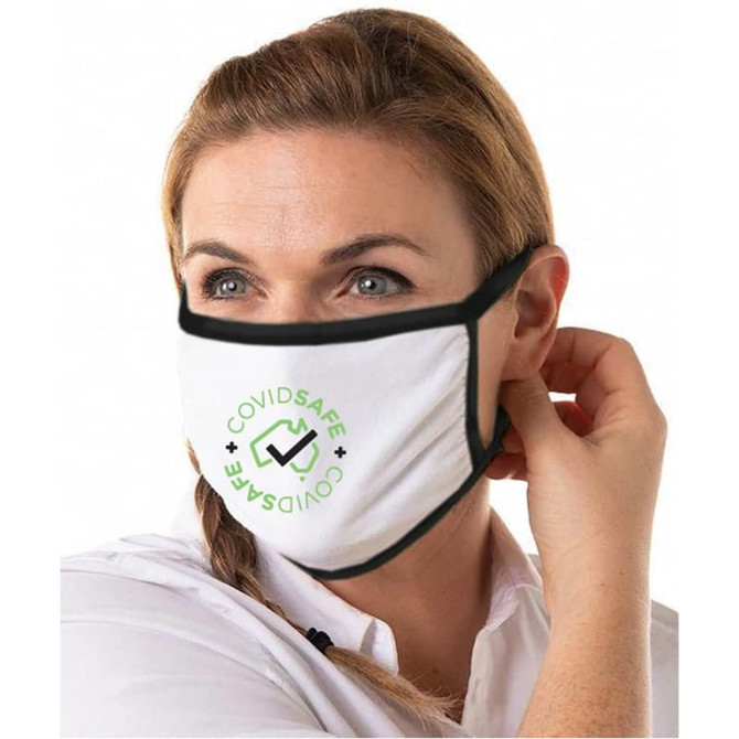 A white cotton face mask with a black border is being worn by a woman, featuring a logo design.