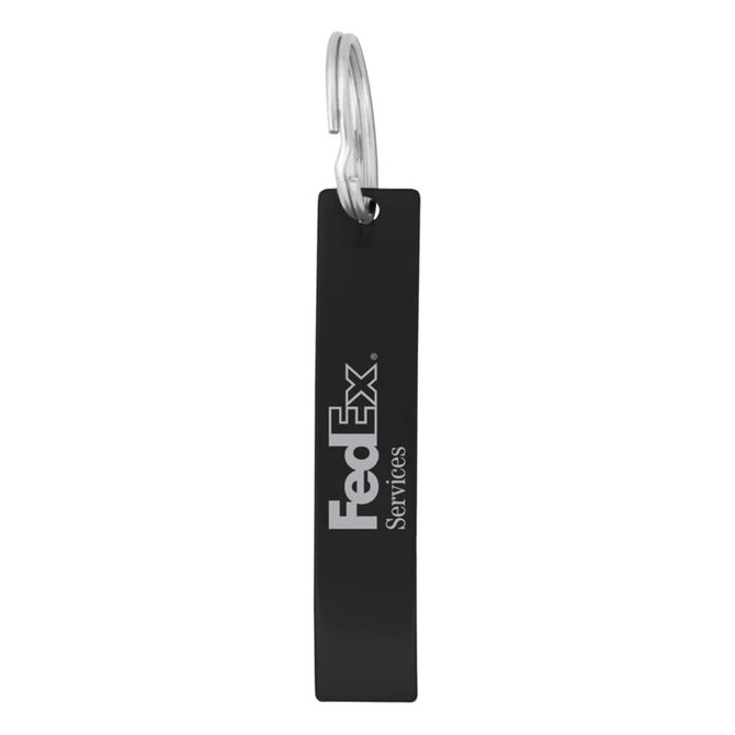 A drink bottle opener in black featuring a branding logo. It has a simple, elongated design with a metal loop.